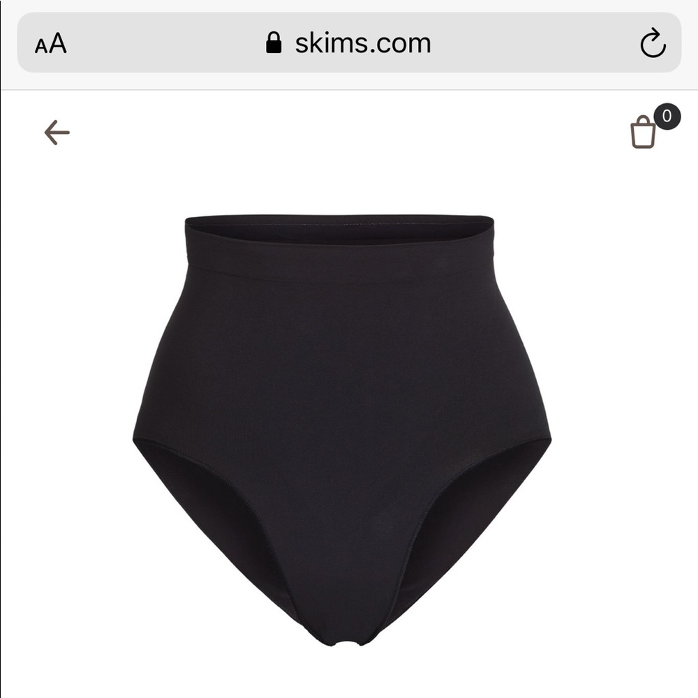 Skims mid waist brief
